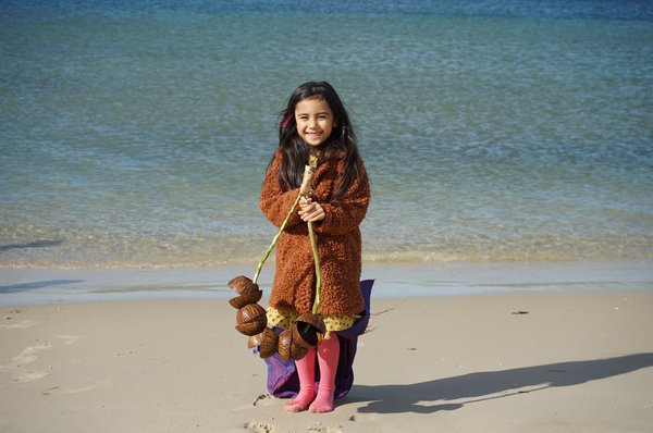 Faith Tupoa Mise holding a fāngongo