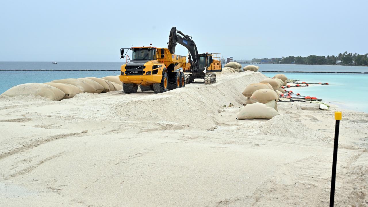 A digger and a truck at the Tuvalu Coastal Adaptation Project