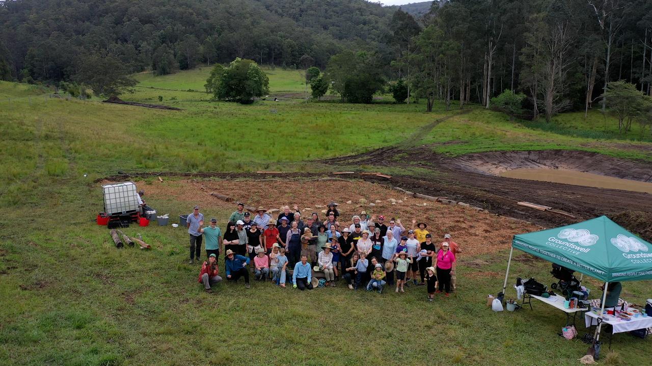 volunteers at a planting day for a tiny forest in Wyong Creek, NSW,