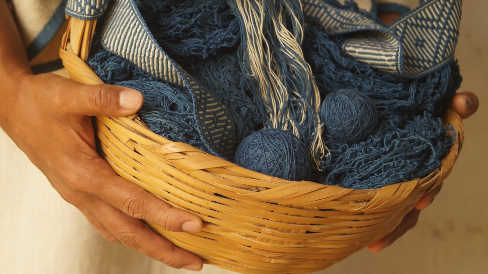 Weaving is a traditional textile skill that involves using yarn to create cloths