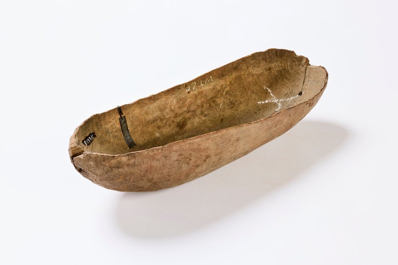 Elongated wooden fish carrier from Mornington Island, Australia.