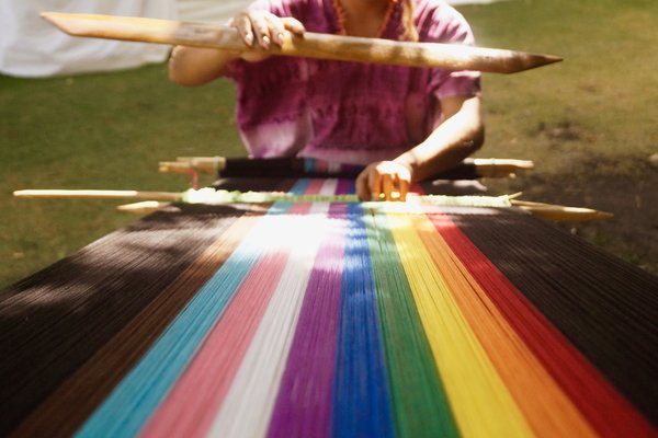 Weaving Memory: Pride 2024, Xaneri Damian weaving backstrap loom, Mexico City
