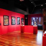 <i>Bloodsuckers: Nature's Vampires</i> exhibition featuring a cinema-style display exploring how blood-feeding animals have inspired vampires and other creatures in film, television, and popular culture, including a bust of Count Dracula based on Bela Lugosi's 1931 portrayal.