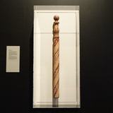 A 19th-century American barber shop pole, its red and white spiral representing bloody and clean bandages, and its rounded top a nod to the leech jars used in bloodletting. On display in <i>Bloodsuckers: Nature's Vampires</i>.