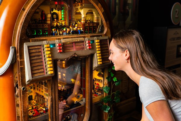 RELICS A New World Rises exhibition featuring Studz Diner. Discover LEGO® worlds thriving within treasured objects from the past.