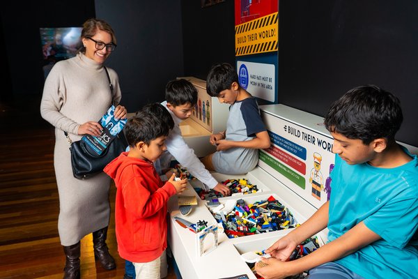 RELICS A New World Rises exhibition featuring the interactive build area. Discover LEGO® worlds thriving within treasured objects from the past.