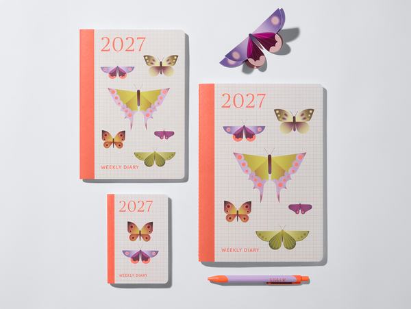 Three sizes of 2027 weekly diaries featuring illustrated butterflies on grid covers, with matching kikki.K pen and paper moth.