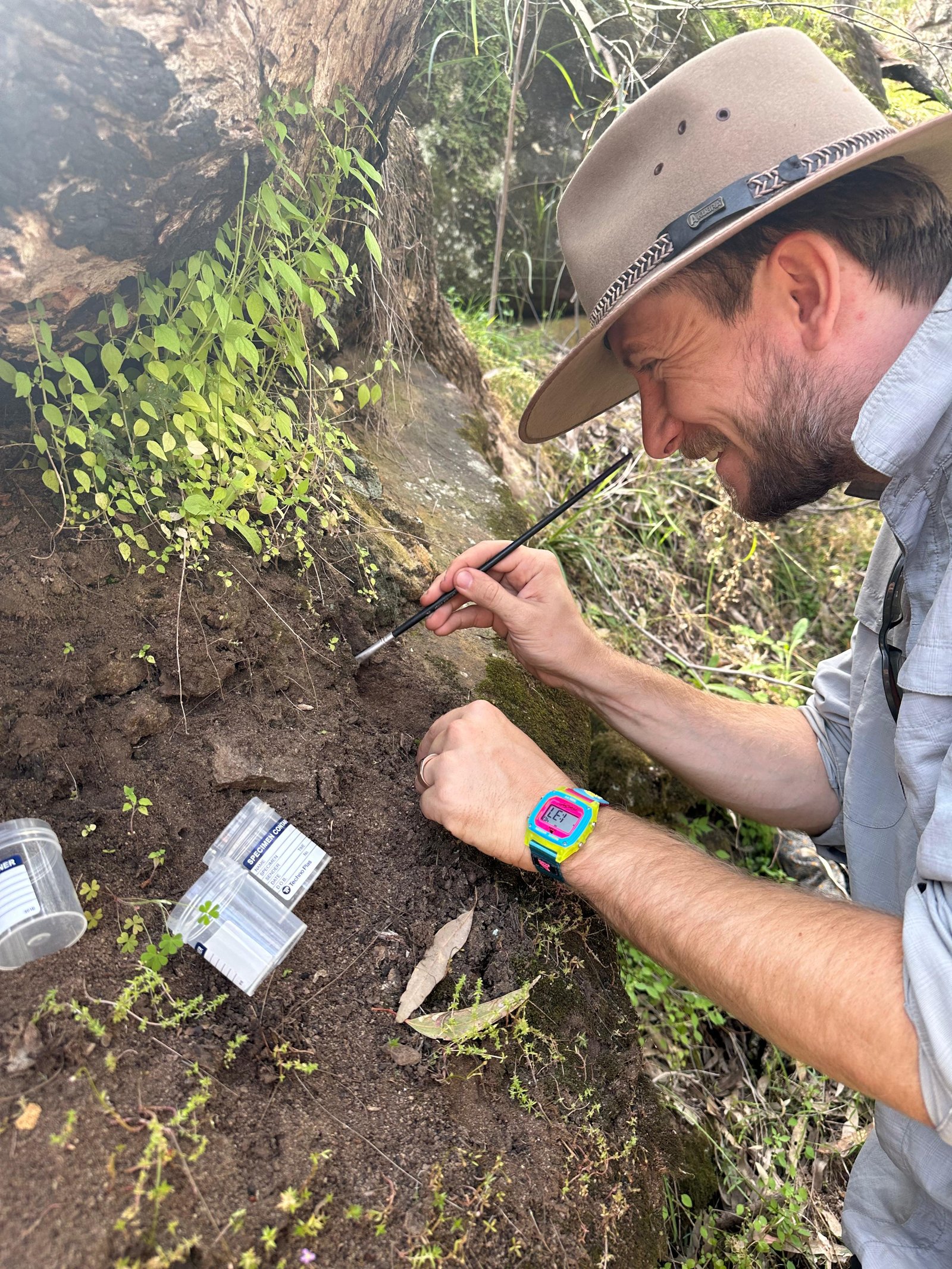Ethan Briggs looking for trapdoor spiders