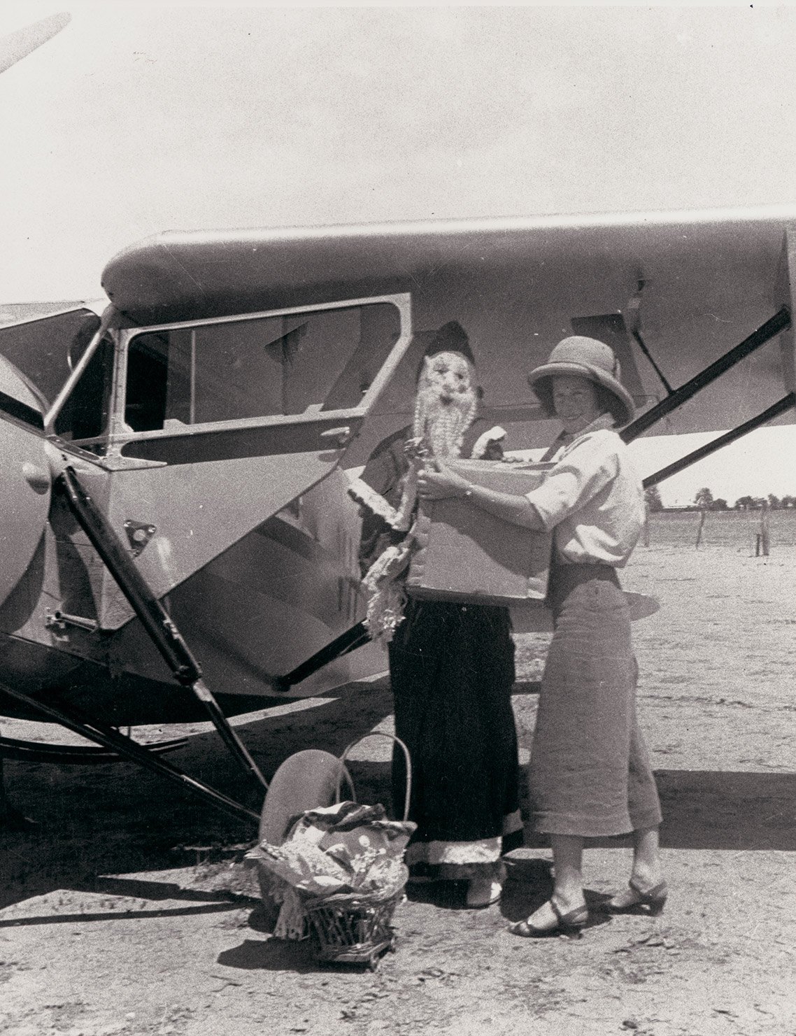 Nancy Bird Walton and plane