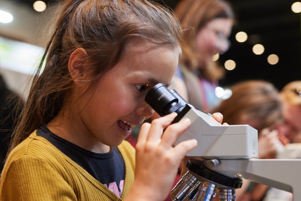 Child using microscope, Sydney Science Trail Community Day 2023