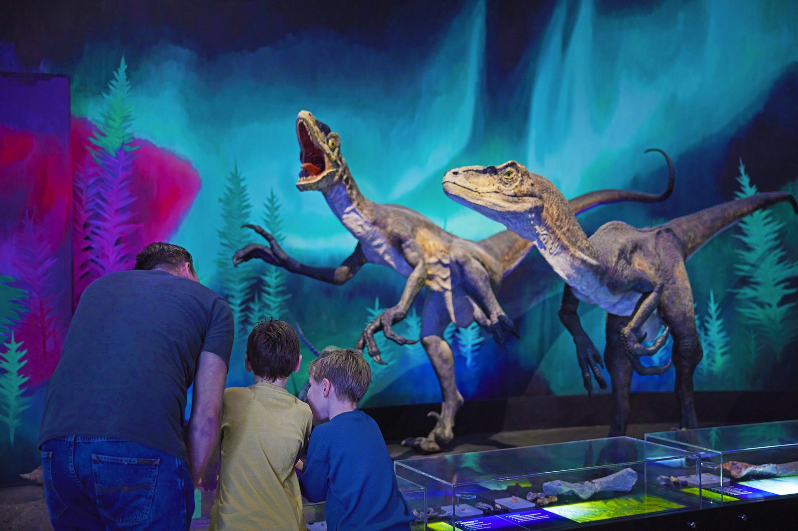 Family in dinosaur exhibition