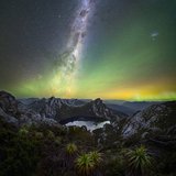 <i>2025 Australian Geographic Nature Photographer of the Year</i>
<p>Winner Astrophotography: Oberon Kenobi by Marley Butler, Loinnekumme Country, Southwest National Park, Tasmania.
<p><i>An amphitheatre of pandani watch on as the galactic core, swathed in airglow, rises over an alpine lake, nestled in a rugged Tassie mountain range. Lady Aurora dances under the Magellanic Clouds. This image was captured on a crisp night in one of Tasmania’s more rugged and majestic multi-day walks.</i>