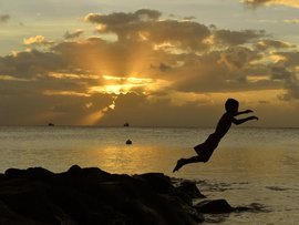 A child jumps into a lagoon in Tuvalu (file image)