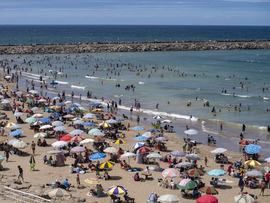 People enjoy the beach in Morocco