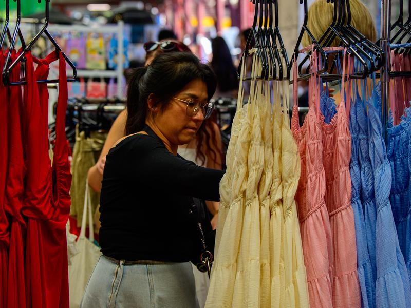 A woman shopping for dresses in Melbourne