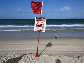 Woorim Beach is seen closed on Bribie Island, North of Brisbane,