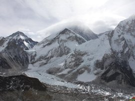 The tip of Mount Everest hiding behind clouds (file image)