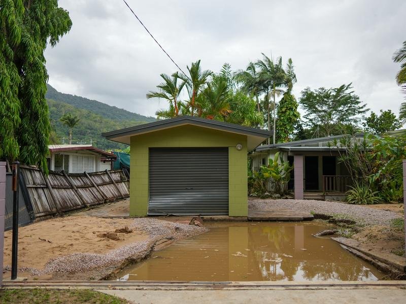 A damaged house in the suburb of Caravonica in Cairns, Queensland