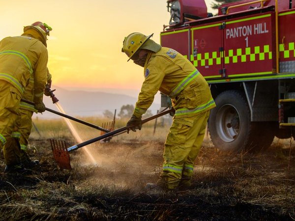 Firefighters extinguish a fire.